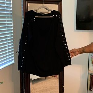 Black summer sweater with silver studded sleeves.